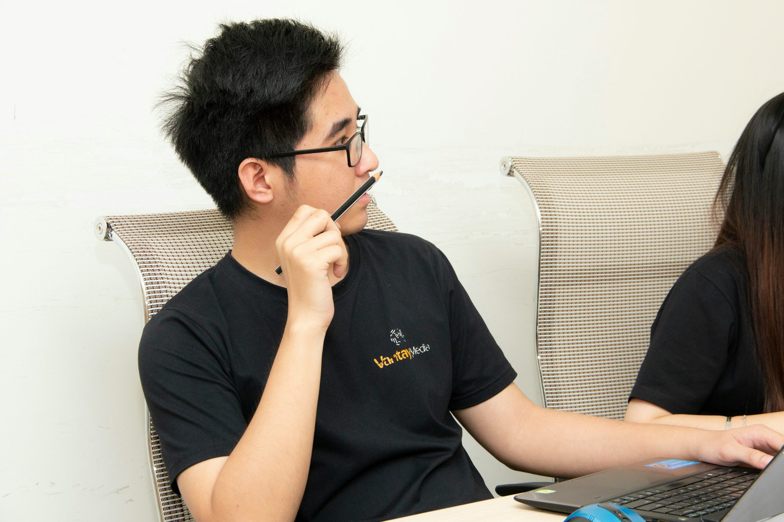 Clients discussing website features with a project manager