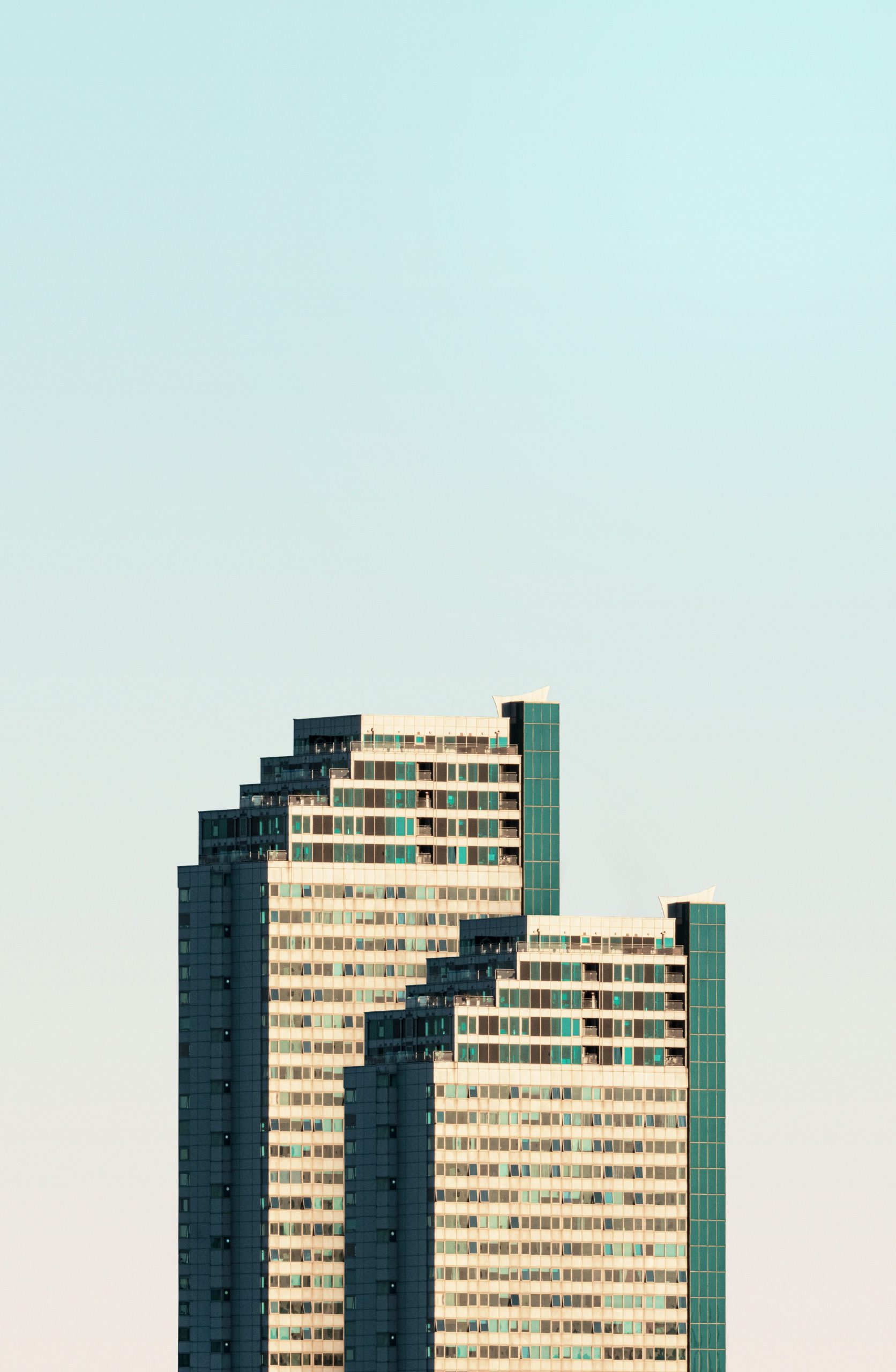 Modern open plan office with large windows overlooking a city skyline, representing a forward-thinking digital agency